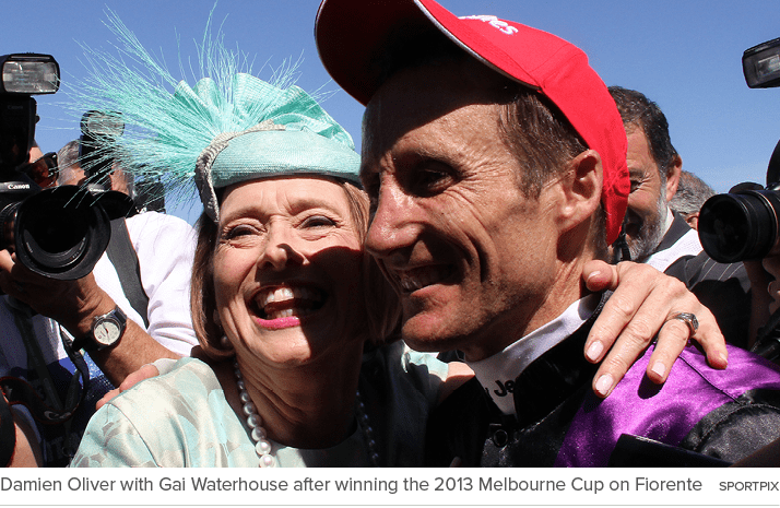 Damien Oliver with Gai Waterhouse after winning the 2013 Melbourne Cup on Fiorente SPORtPI