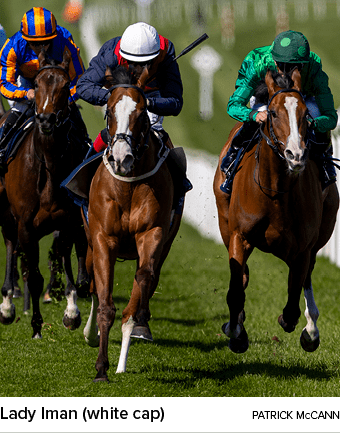 Lady Iman (white cap) Patrick McCan